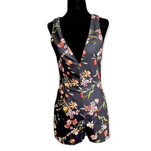 Kendall and Kylie brand, flowery romper.  Never worn.  In perfect condition.
